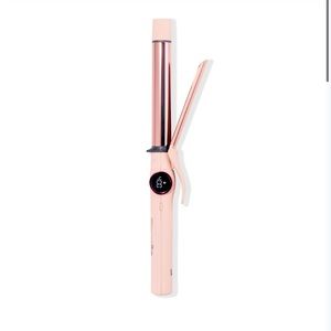 1” Le Clip curling iron. Brand new in box.